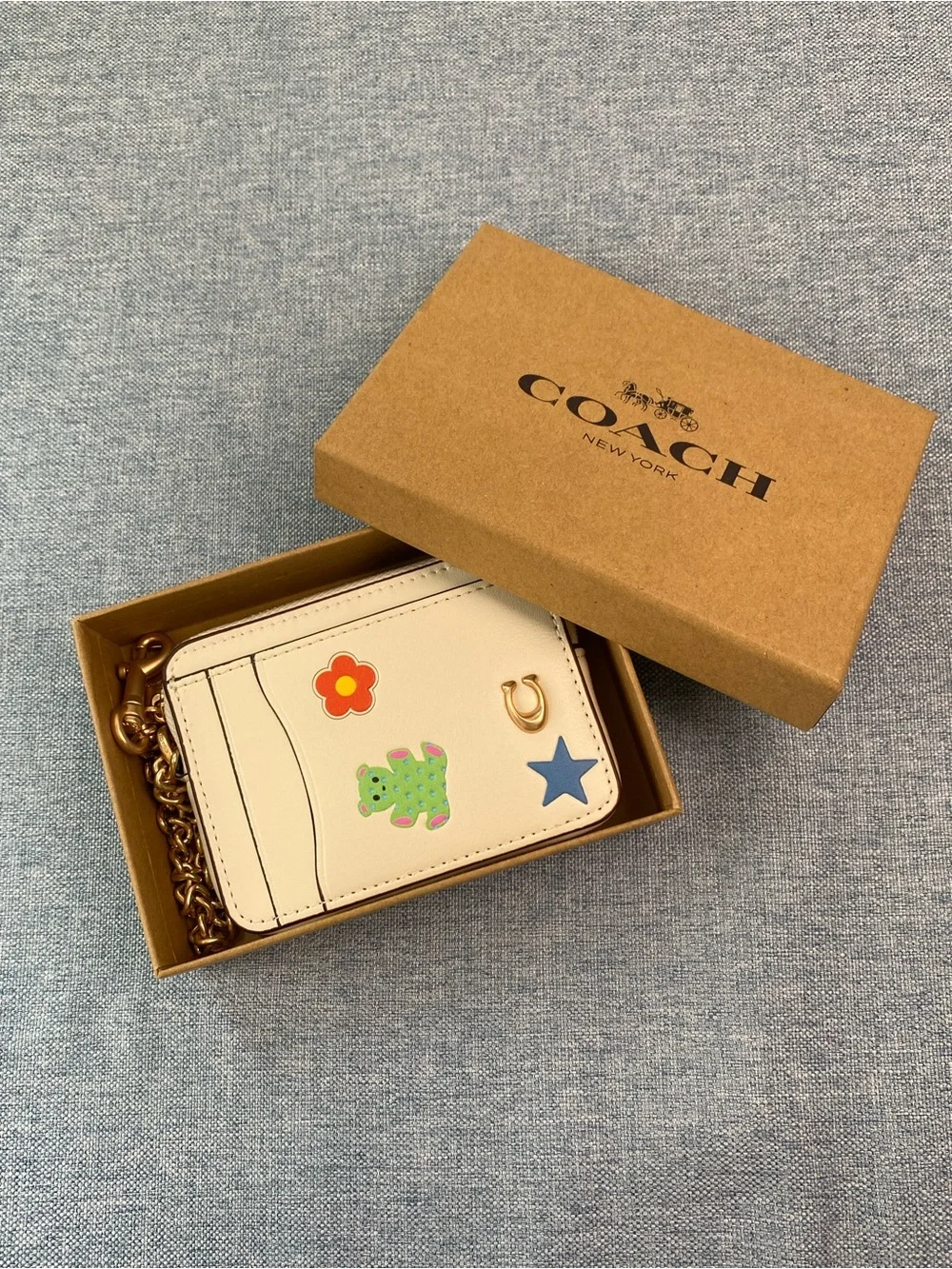 Coach Cream Card Holder with Gold Chain and Playful Charms
